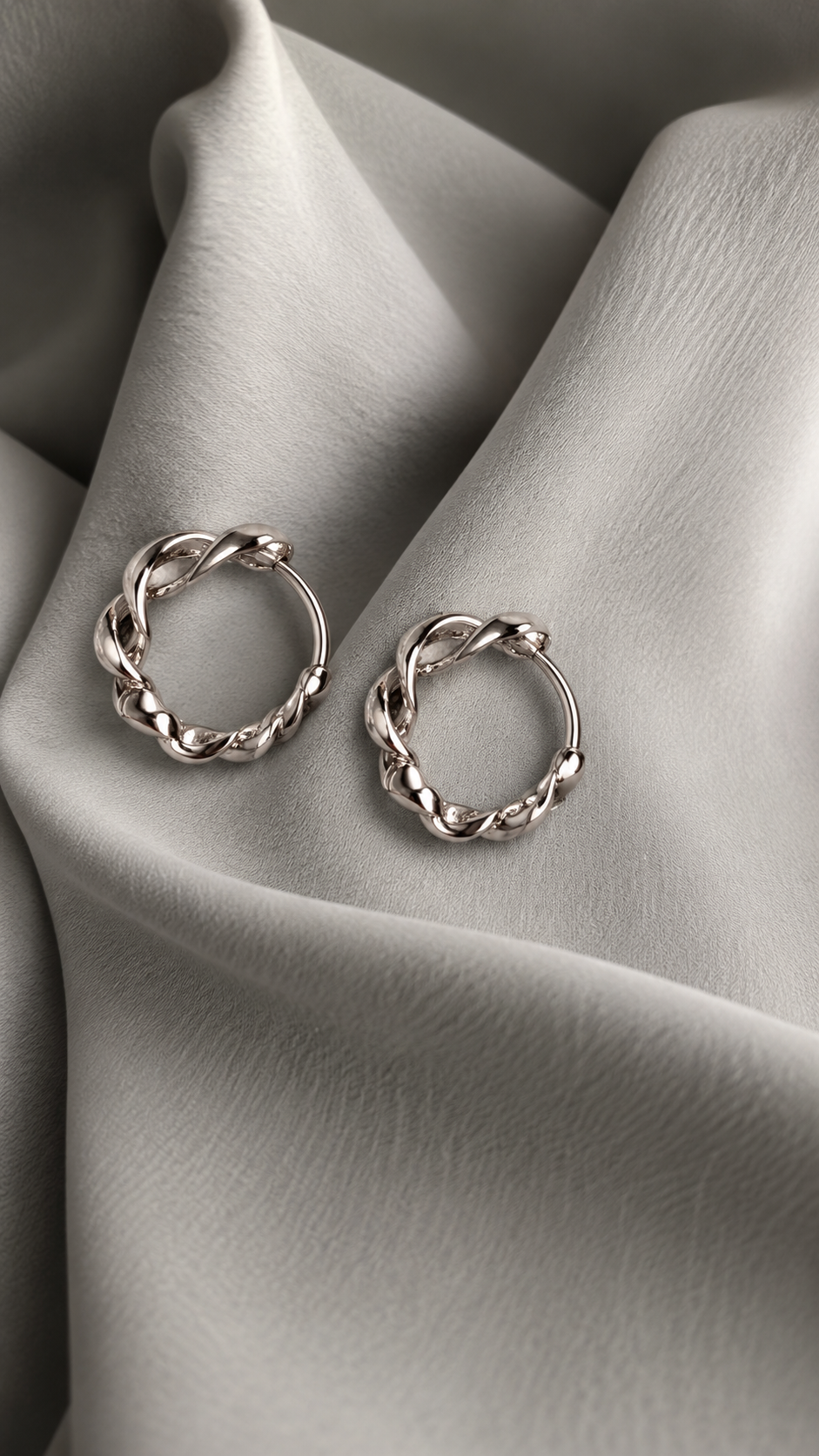Sculpted Twist Silver Hoop Earrings