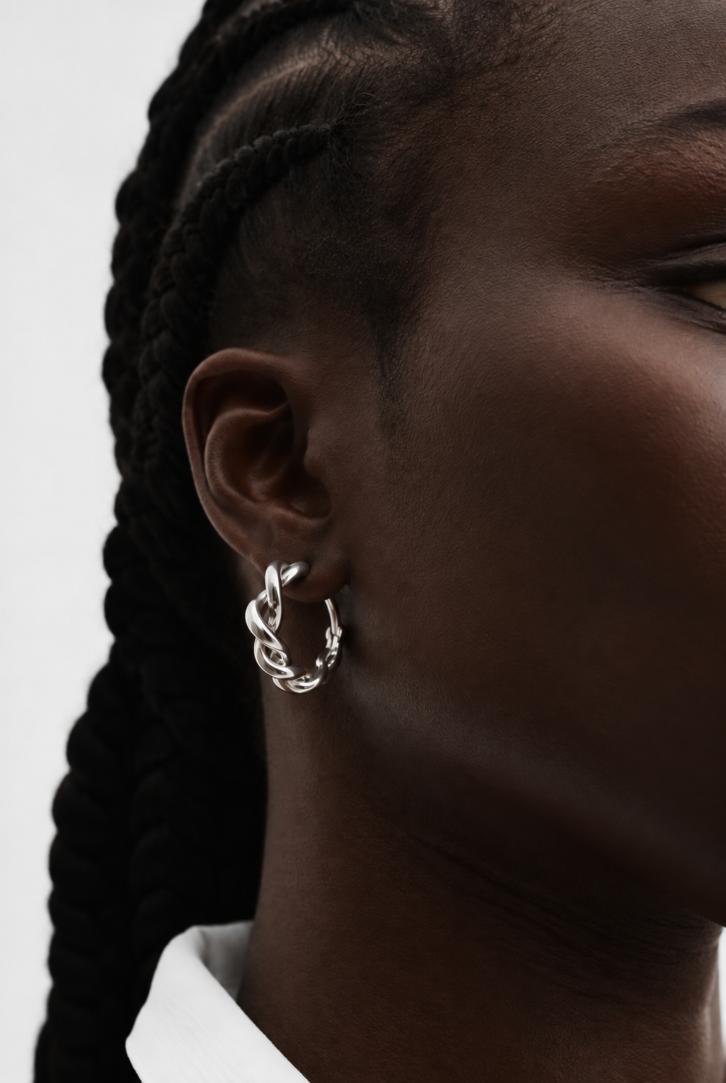 Sculpted Twist Silver Hoop Earrings