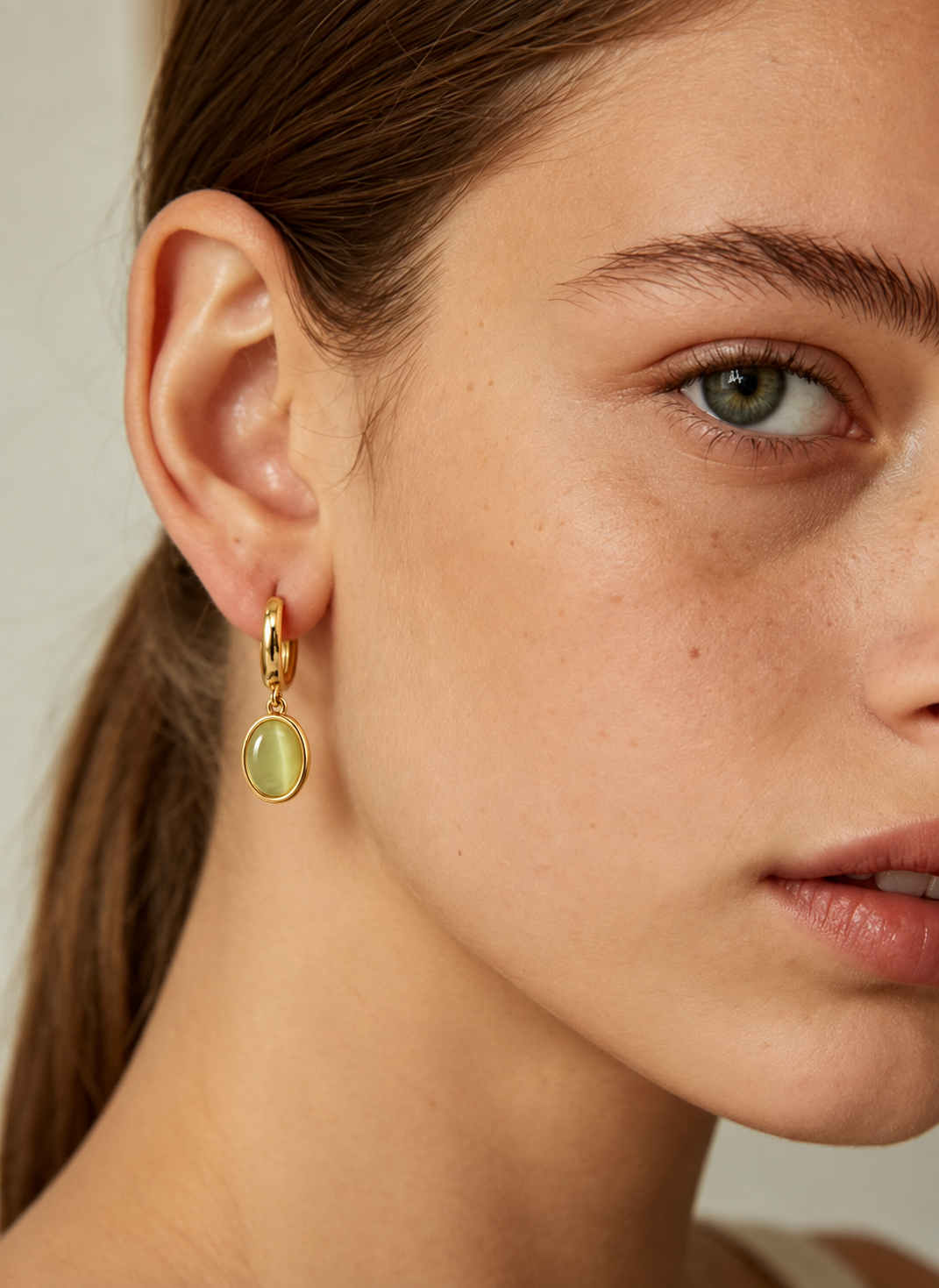 Oval Green Stone Gold Huggie Drop Earrings